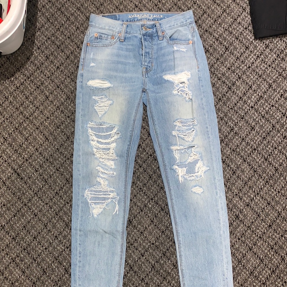 Light blue ripped distressed jeans